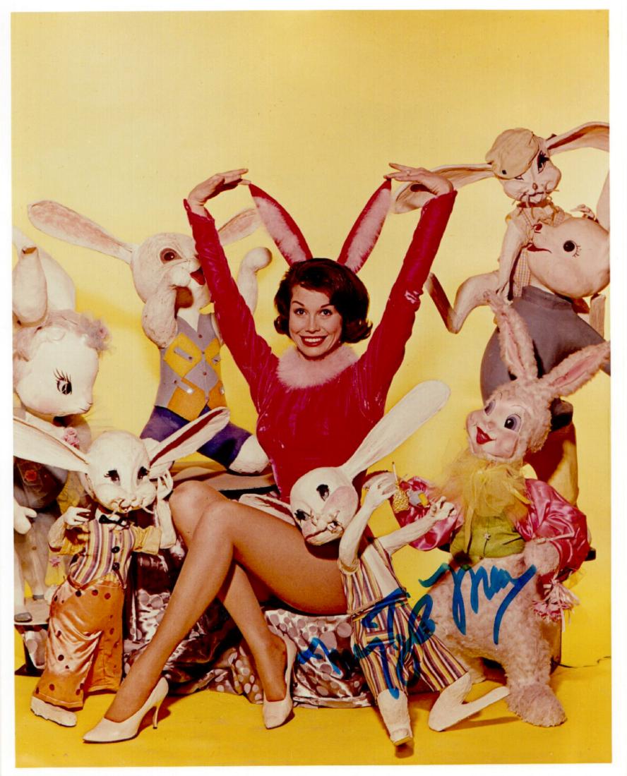 Actress MARY TYLER MOORE - Photo Signed: Mary Tyler Moore (1936-2017) Actress. Moore became one of television's most beloved wives, playing Laura Petrie on The Dick Van Dyke Show, and won two Emmys for her work on the series. The Mary Tyler