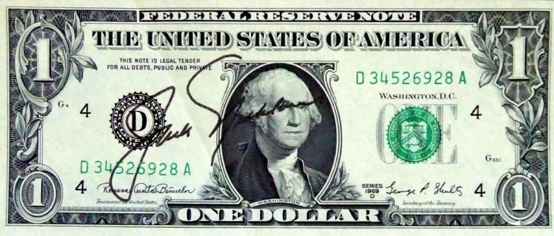 JACK NICKLAUS - Uncirculated $1 Bill Signed: Jack Nicklaus. 6” x 2 ½”, uncirculated dollar bill, signed.