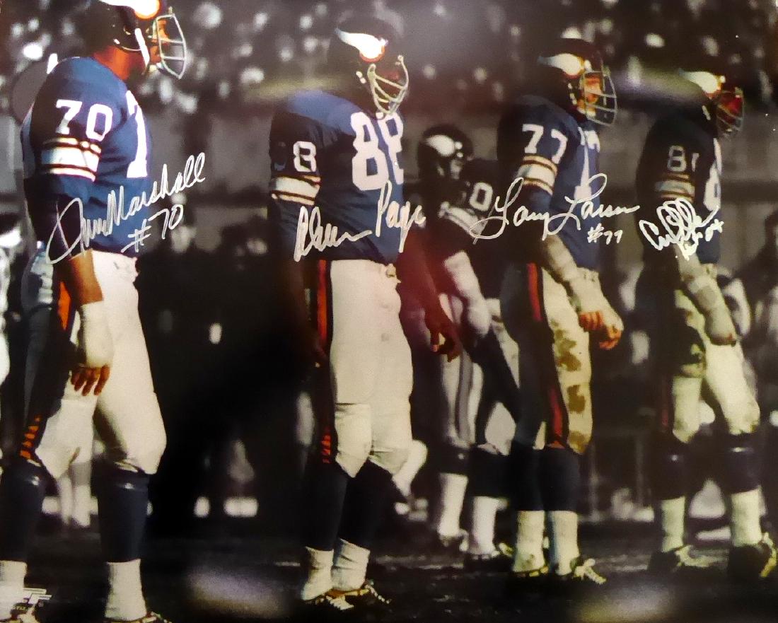 Vikings "Purple People Eaters" - Photo Signed By Four: Minnesota Vikings – “Purple People Eaters”. During the late 1960’s and early 1970’s this was the most dominate defensive line that the NFL has ever seen. Jim Marshall, (1937- ), Carl Eller (