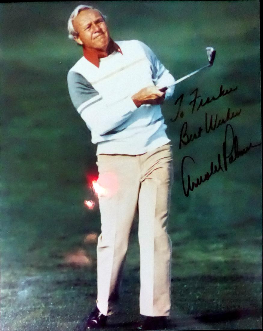 Golfer ARNOLD PALMER - Photo Signed: Arnold Palmer (1929-2016) Golfer. Palmer was the first golfer to win the Masters Tournament four times and is generally regarded as one of the greatest players in the history of men's professional gol
