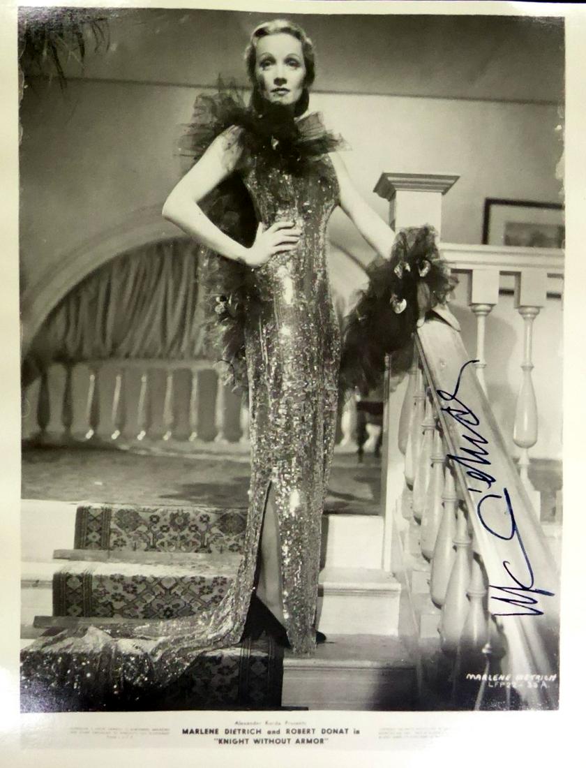 German Actress MARLENE DIETRICH - Photo: Marlene Dietrich. 8” 10” black and white movie photo of Dietrich from her film Knight Without Armor, signed.