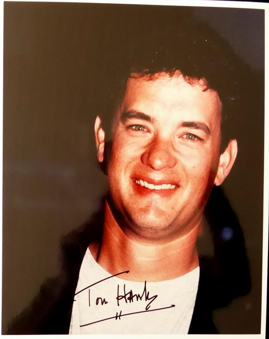 Actor TOM HANKS - Photo: Tom Hanks (1956- ) Actor. Hanks is known for his comedic and dramatic roles in such films as Splash (1984), Big (1988), Turner & Hooch (1989), A League of Their Own(1992), Sleepless in Seattle