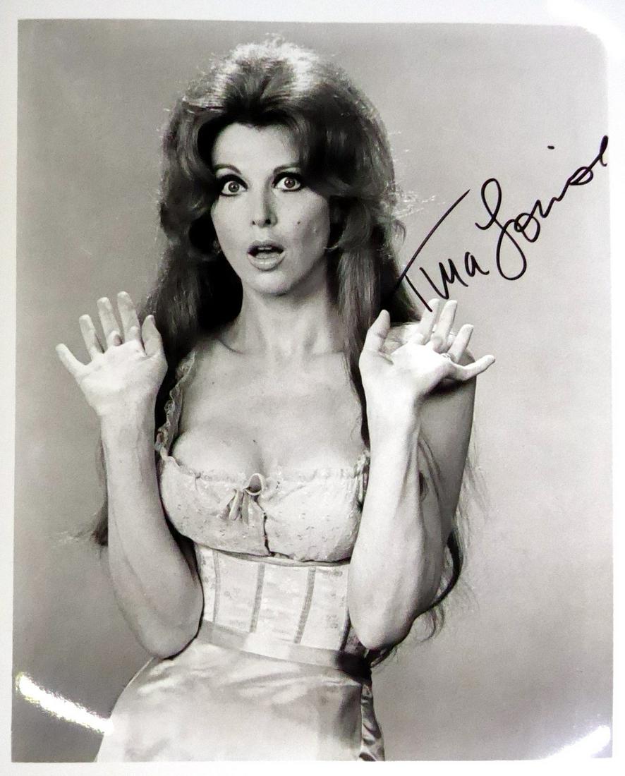Actress TINA LOUISE - Photo: Tina Louise(1934- ) Actress. Louise best known for playing movie star Ginger Grant in the CBS television situation comedy Gilligan's Island. 8” x 10” black and white photograph, signed.