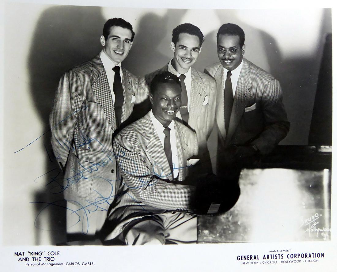 Pianist, Singer NAT "KING" COLE - Photo: Nat “King” Cole (1919-1965) Pianist, singer. Cole first came to prominence as a jazz pianist. He owes most of his popular musical fame to his soft baritone voice, which he used to perform in big b