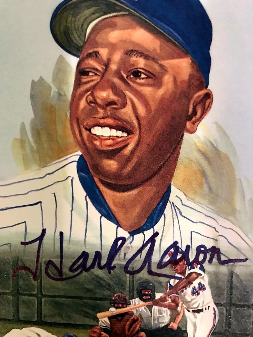 Homerun King HENRY AARON - Photocard: Henry Louis Aaron (born February 5, 1934) He was inducted into the National Baseball Hall of Fame in 1982.Signed Post Card with his likeness on the card.