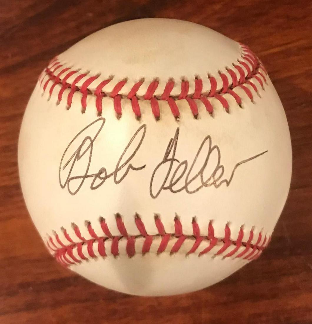 Indians BOB FELLER - Baseball: Robert William Andrew Feller (November 3, 1918 – December 15, 2010) He was inducted into HOF in 1962. Signed Bobby Brown baseball with JSA Authentication. Case included. Excellent condition