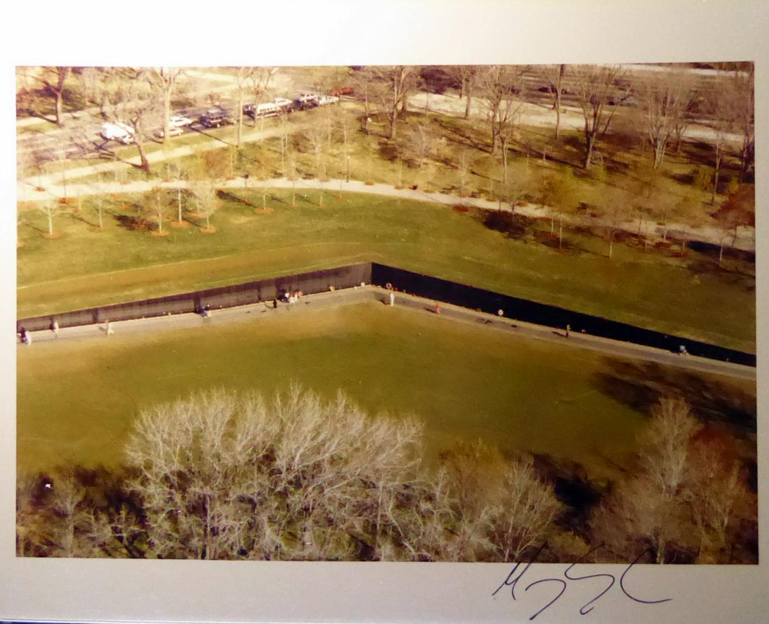 Artist, Architect MAYA LIN - Photo Signed: Maya Lin (1959- ) Designer, architect, and artist. Lin best known for her design of the Vietnam Veterans Memorial in Washington, D.C. 10” x 8” color photograph of the memorial, signed.