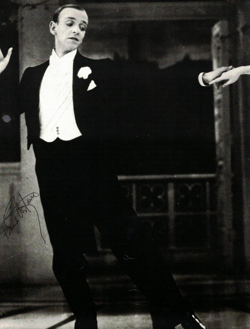 Actor, Dancer FRED ASTAIRE - Photo Signed: Fred Astaire (1899-1987) Actor, dancer. Astaire is widely regarded as one of the most influential dancers in the history of film and television musicals. 8 ½” x 10 ¾” black and white magazine ph