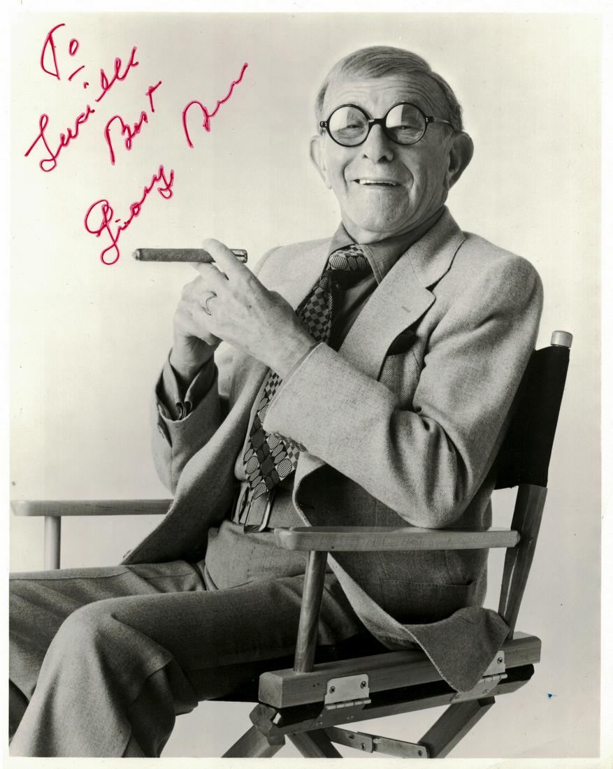 Comedian, Actor GEORGE BURNS - Photo Signed: George Burns (1896-1996) Comedian, actor. Burns was one of the few entertainers whose career successfully spanned vaudeville, film, radio, and television. His arched eyebrow and cigar-smoke punctuatio