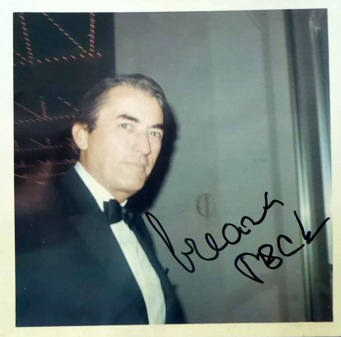 Actor GREGORY PECK - Snap Shot Photo Signed: Gregory Peck (1916-2003) Actor. Peck was best known for his Oscar-winning role as Atticus Finch in To Kill a Mockingbird. Lean and handsome, Peck played stalwart and decent heroes in dozens of dramas,