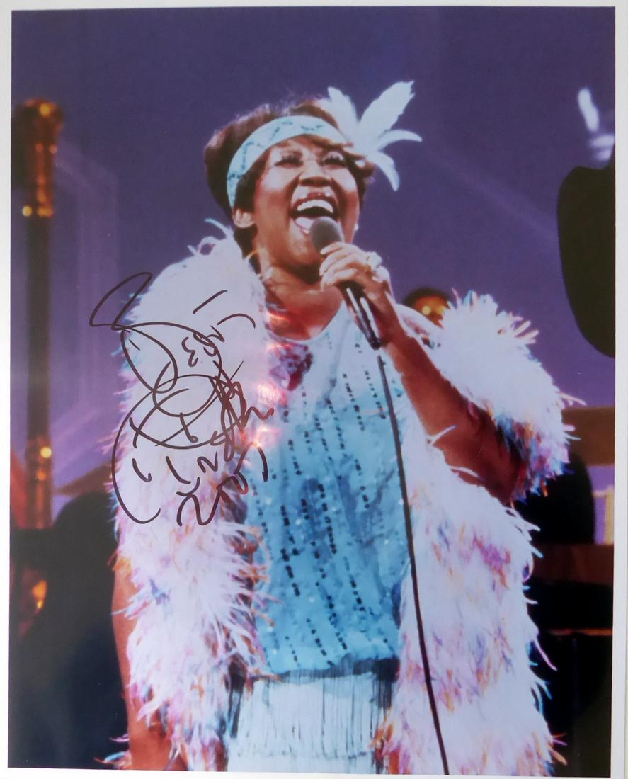 Singer ARETHA FRANKLIN - Photo Signed: Aretha Franklin (1942-2018) Singer. Franklin was a multiple Grammy winner and dubbed, "Queen of Soul". She was known for such hits as "Respect," "Freeway of Love" and "I Say a Little Prayer." 8” x 1