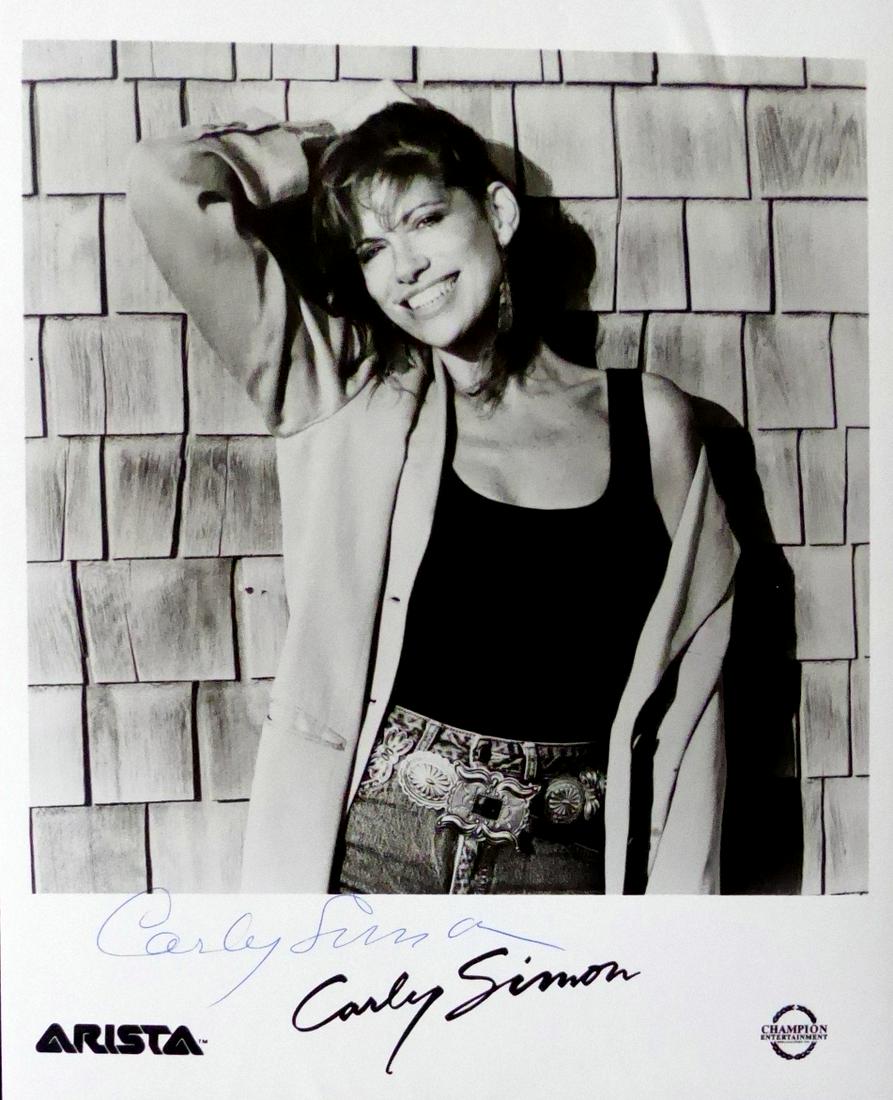 Singer, Songwriter CARLY SIMON - Photo: Carly Simon (1945- ) Singer, songwriter. Simon was one of the biggest singer/songwriters in the 1970s. She was famously married to fellow rocker James Taylor and wrote the 1972 hit single 'You're So V