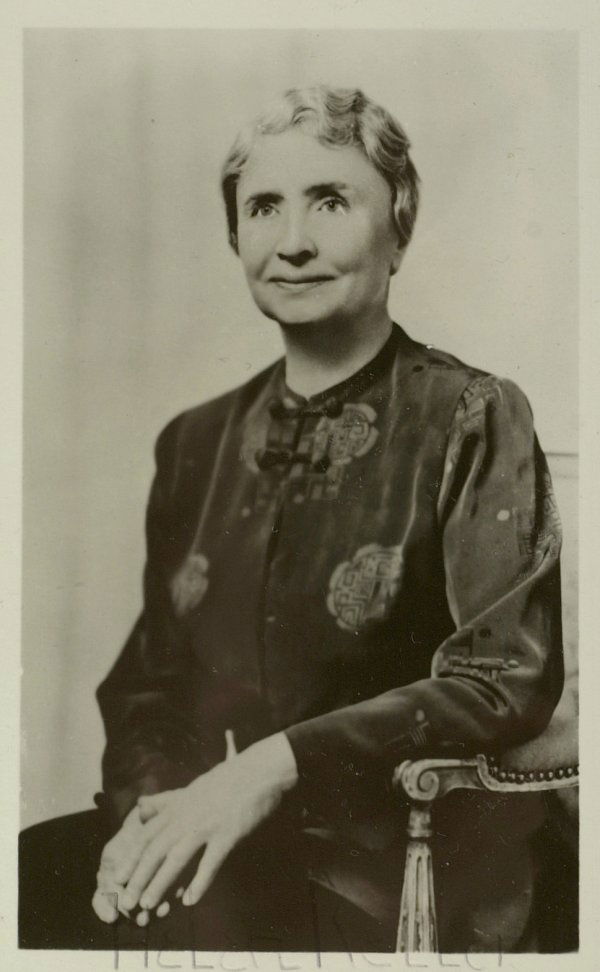 Author HELEN KELLER - Photo Signed: Helen Keller (1880-1968) Author and campaigner for the blind. 3 ½" x 5 ½" black and white photograph, signed in pencil.