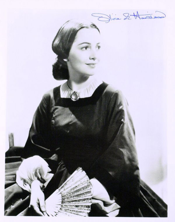 GWTW "Melanie" OLIVIA de HAVILLAND - Photo Signed: Olivia de Havilland (1916- ) Actress. De Havilland had one of her most memorable roles, as Melanie Hamilton in 1939's Gone With The Wind. She won an Oscar in 1946 for To Each His Own, and another in 1
