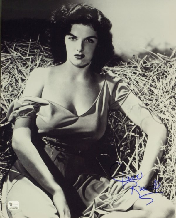 Buxom Actress JANE RUSSELL - Two Photos Signed: Jane Russell (1921- ) Actress. Russell made her motion picture debut in The Outlaw 1n 1941, a story about Billy the Kid that went to great lengths to showcase her voluptuous figure. The release of the