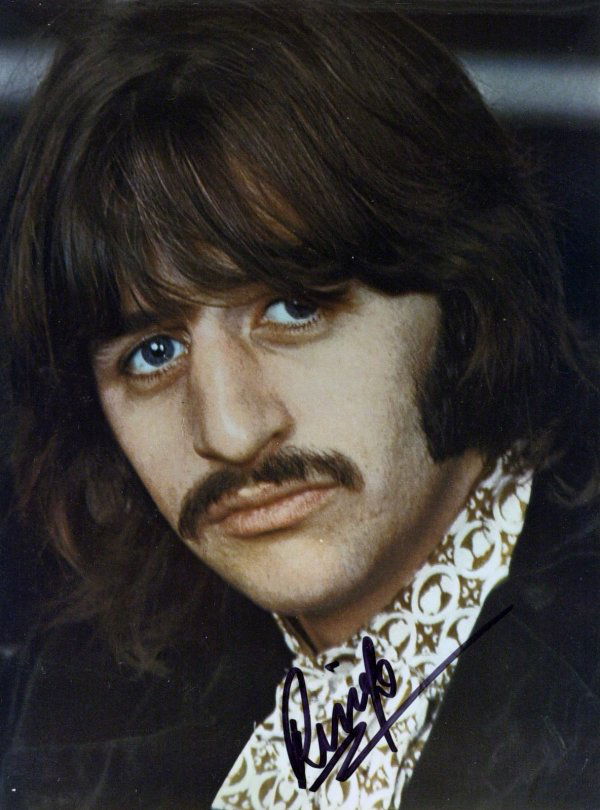 Beatle Drummer RINGO STARR - Photo Signed: Ringo Starr (1940- ) Starr is best known as the drummer for The Beatles. Starr was the last to join The Beatles line up, replacing Pete Best. 8" x 10" color photograph signed, "Ringo.