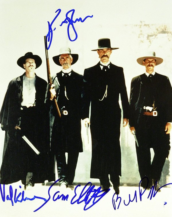 TOMBSTONE - Cast Photo Signed Four Signatures: Tombstone. Tombstone was the 1993 movie about the life and times of the famous cowboy outlaw turned town-taming marshal, Wyatt Earp. The story focuses on the build up to the gunfight at the OK Corral,