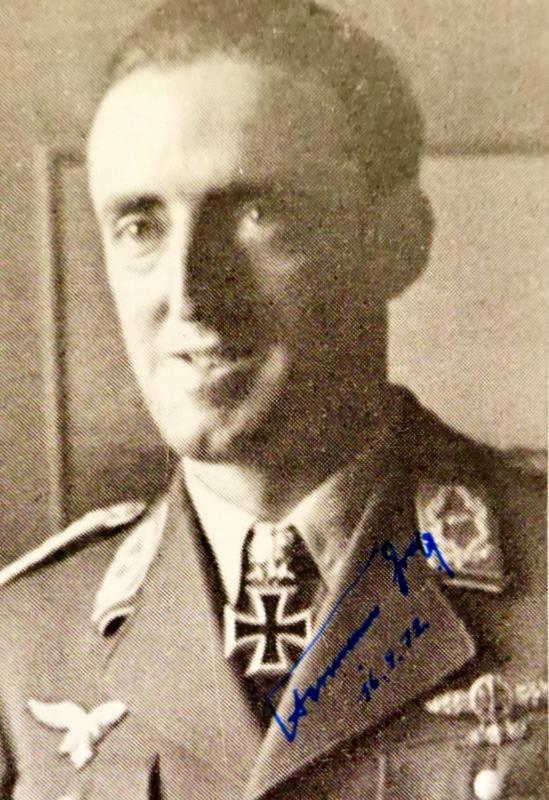 Luthwaffe Ace HERMANN GRAF - Photo Siged: Hermann Graf (1912 -1988) German Luftwaffe World War II fighter ace. Graf served on both the Eastern and Western Fronts. He became the first pilot in aviation history to claim 200 aerial victories. In