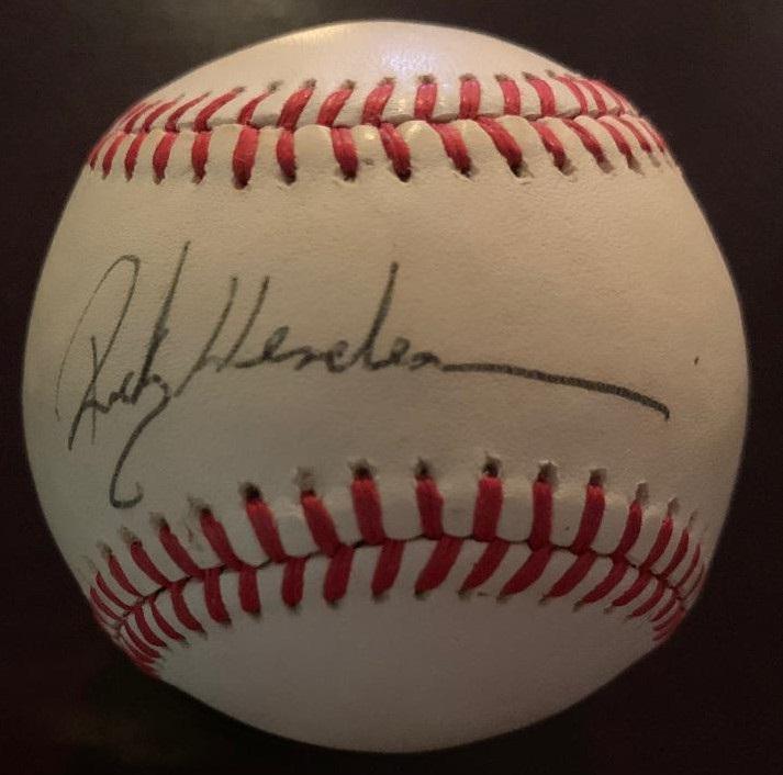 Henderson,Rickey Signed Baseball (1 of 2)