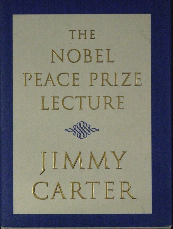 JIMMY CARTER - Nobel Prize Lecture Signed: Jimmy Carter. A 5" x 6 ¾" printed hard copy of The Nobel Peace Prize Lecture, Simon & Schuster, 2002, first edition, signed on a bookplate which has been affixed to the first blank page. An authentic