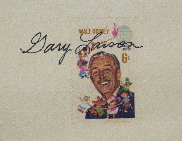 Far Side Cartoonist GARY LARSON - Card Signed: Gary Larson (1950- ) Cartoonist. Larson is the creator of The Far Side, a single-panel comic strip which appeared in many newspapers for fifteen years. 5" x 3" card with the Walt Disney commemorative