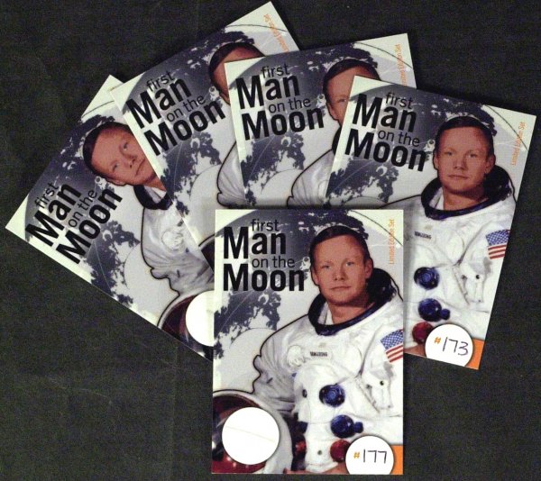 (NEIL ARMSTRONG) - Five Strands of His Hair: (Neil Armstrong) Five 2 ½" x 3 ½" limited edition trading cards ( #173 through # 177), issued by the Newfoundland Card Company each containing a strand of what is purported to be Armstrong's hair.
