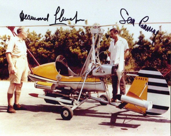 SEAN CONNERY & DESMOND LLEWELYN - Photo: James Bond: Sean Connery and Desmond Llewelyn (1914-1999) British actor. Llewelyn played "Q," the crusty purveyor of secret-agent gadgets, in seventeen James Bond films. 10" x 8" color movie still fro