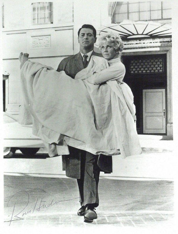 Actor ROCK HUDSON - Movie Still Signed: Rock Hudson (1925-1985) Actor. Hudson completed nearly 70 motion pictures and starred in several television productions during a career that spanned over four decades. 8" x 10" black and white movie s