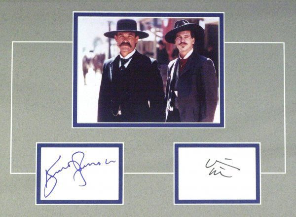 KURT RUSSELL & VAL KILMER - Cards Signed: Tombstone. Tombstone was the 1993 movie about the life and times of the famous cowboy outlaw turned town-taming marshal, Wyatt Earp. The story focuses on the build up to the gunfight at the OK Corral,