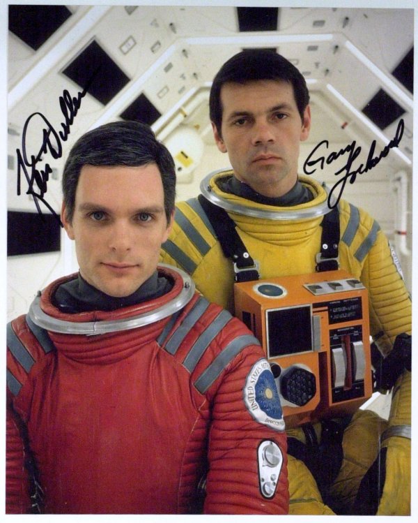 2001 A SPACE ODYSSEY - Two Photos Signed: 2001 A Space Odyssey. 2001 A Space Odyssey is a 1968 science fiction film directed by Stanley Kubrick and written by Kubrick and Arthur C. Clarke. The film deals with thematic elements of human evolut