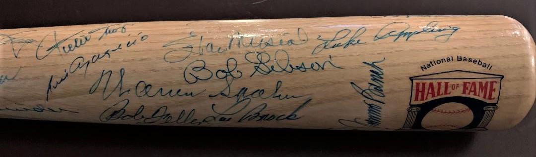 Multi Signed HOF (49) Signed Bat: Multi Signed Cooperstown Adirondack bat signed by (45) HOFers. Signees include: Hank Aaron, Mel Allen, Luis Aparicio, Luke Appling, Ernie Banks, Al Barlick, Johnny Bench, Yogi Berra, Lou Brock, Ray Da