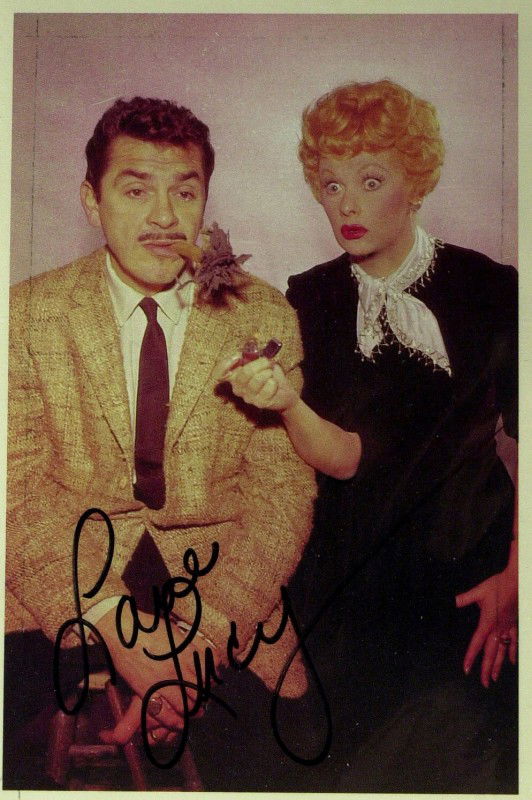 LUCILLE BALL - Photo with Ernie Kovacs: Lucille Ball. 4" x 6" color post card photograph with comedian Ernie Kovacs signed, "Love Lucy.