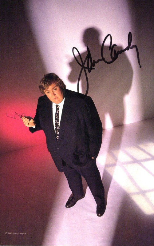 Canadian Comic JOHN CANDY - Color Photo Signed: John Candy (1950-1994) Canadian comedian. Candy rose to fame in his role in comedy films such as Stripes, Splash, Cool Runnings, The Great Outdoors, and Uncle Buck. One of his most renowned onscreen p