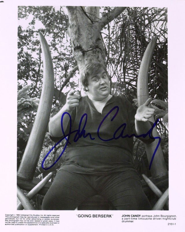Comic JOHN CANDY - Photo Signed: John Candy. 8" x 10" black and white promotional photograph from his 1983 film, Going Berserk, signed.