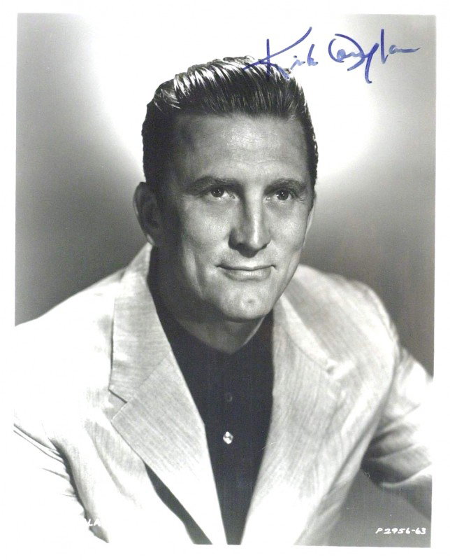 Actor KIRK DOUGLAS - Photo Signed: Kirk Douglas. 8" x 10" black and white photograph signed.