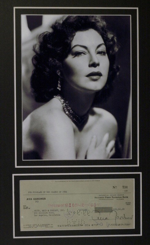 Beautiful AVA GARDNER - Check Signed Matted: Ava Gardner (1922-1990) Actress. Gardner played temptresses and seductive heroines in films such as One Touch of Venus, Show Boat, The Snows of Kilimanjaro, and The Barefoot Contessa. A sensuous, dark
