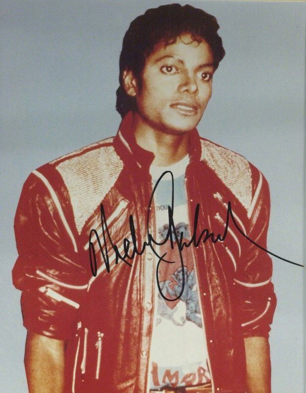 Thriller Singer MICHAEL JACKSON - Color Photo Sign: Michael Jackson (1958-2009) Singer. Jackson became a dominant figure in popular music in the early 1980's and the first African-American entertainer to amass a strong crossover following on MTV. The p