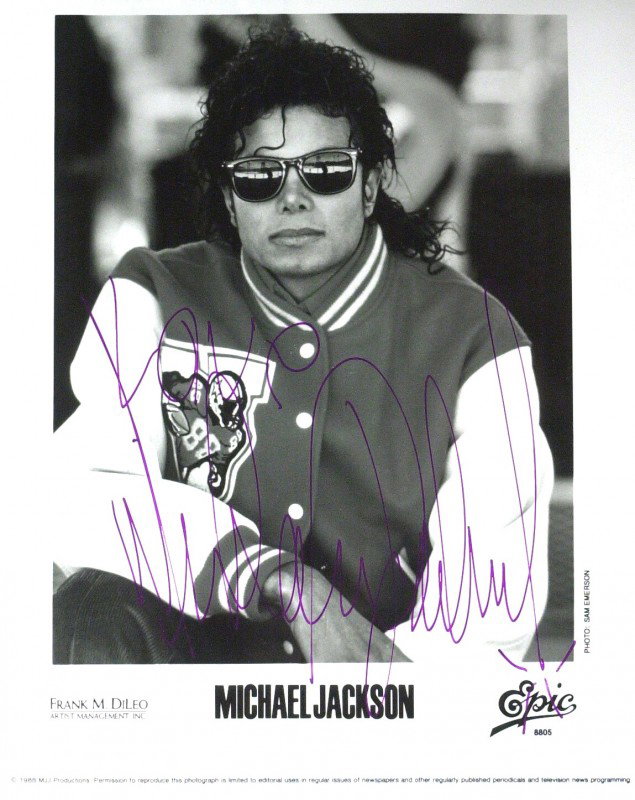 Singer MICHAEL JACKSON - Promotional Photo Signed: Michael Jackson. 8" x 10" black and white promotional photograph from Epic, signed.