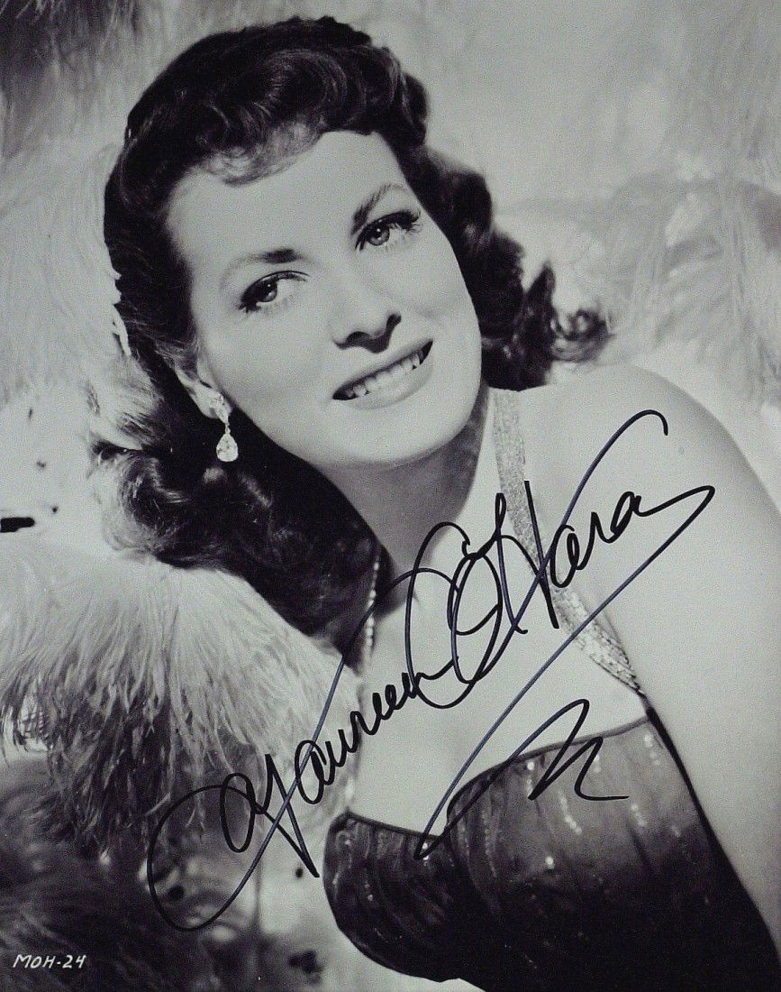 MAUREEN O'HARA - Photo Signed: Maureen O'Hara (1920- ) Irish actress. O'Hara has been noted for playing fiercely passionate heroines with a highly sensible attitude. She often worked with director John Ford and longtime friend John