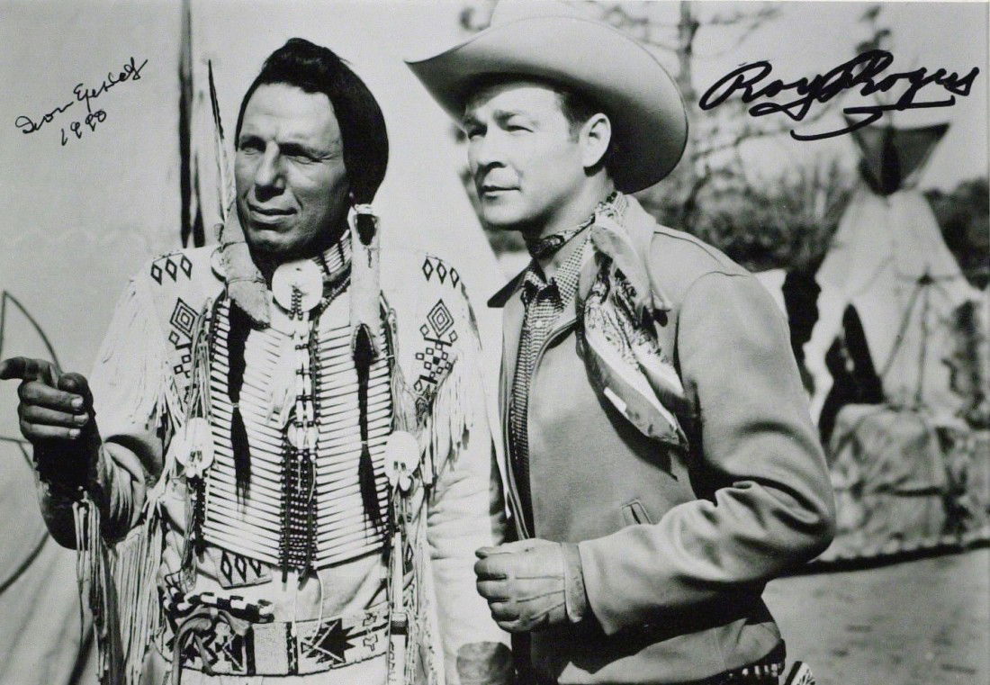 ROY ROGERS & IRON EYES CODY - Photo Signed: Roy Rogers (1911-1998) and Iron Eyes Cody (1904-1999) Actors. Rogers was called the "King of the Cowboys" during his long career as a folksy singing hero of movies and television. Iron Eyes was recogn