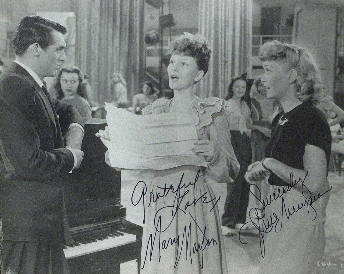 NIGHT and DAY - 1946 Film Cast Signed: Night and Day. Night and Day was a 1946 film in which Cary Grant portrays Cole Porter in this biographical film about the composer's life. 10" x 8" black and white movie still signed by Mary Martin "G