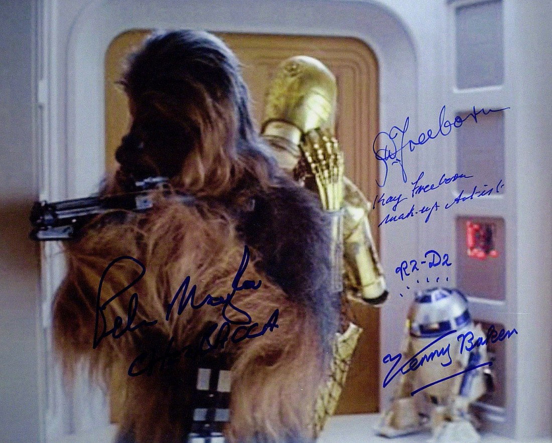 STAR WARS: KENNY BAKER & PETER MAYHEW: Star Wars. 10" x 8" color photograph signed by two principal characters, R2-D2 , Kenny Baker (1934- ) "R2 – D2 Kenny Baker, Chewbacca, Peter Mayhew (1944- ) "Peter Mayhew Chewbacca" and the make-up 