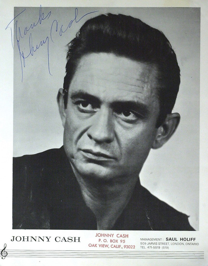 JOHNNY CASH - Youthful Photo Signed: Johnny Cash (1932-2003) Country singer. "The Man in Black" as Cash was known, had been one of the most influential figures in country music since the 1950s. 8" x 10" promotional black and white photog