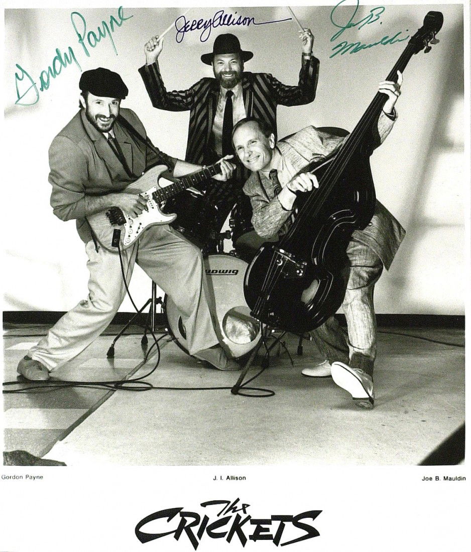 THE CRICKETS - Photo Signed By Three: The Crickets. The Crickets are a rock & roll band formed by singer/songwriter Buddy Holly in the 1950s. They continued performing after Holly's death. 8" x 10" promotional black and white photograph s