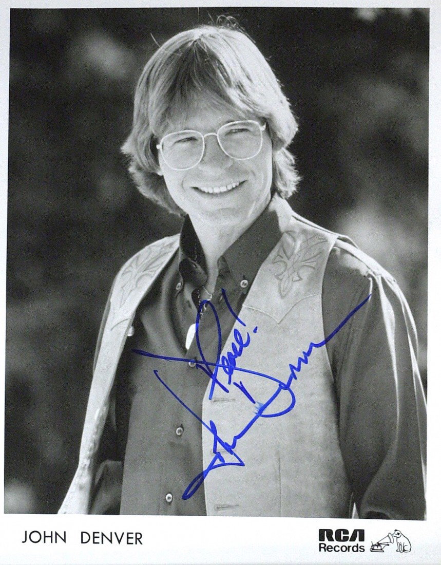 JOHN DENVER - Photo Signed: John Denver (1943-1997) Singer. Denver was among the top mainstream country/pop of the early to mid 1970s. His music career spanned nearly three decades and he touched the hearts of millions with his 
