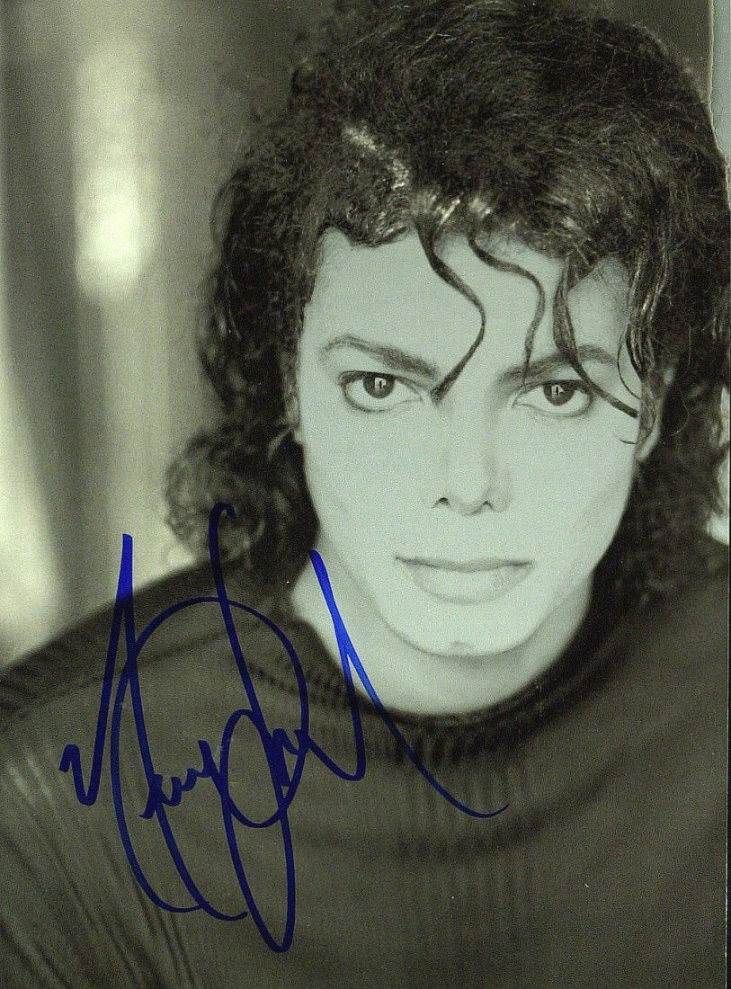 MICHAEL JACKSON - Striking Photo Signed: Michael Jackson (1958-2009) Singer. Jackson became a dominant figure in popular music in the early 1980's and the first African-American entertainer to amass a strong crossover following on MTV. The p