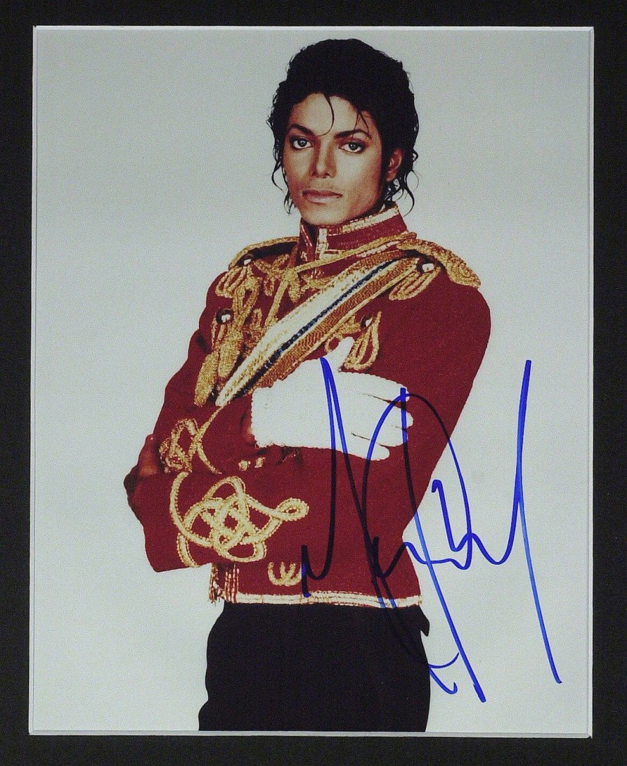 MICHAEL JACKSON - Color Photo Signed: Michael Jackson. 8" x 10" color photograph signed. Matted to 11" x 14".