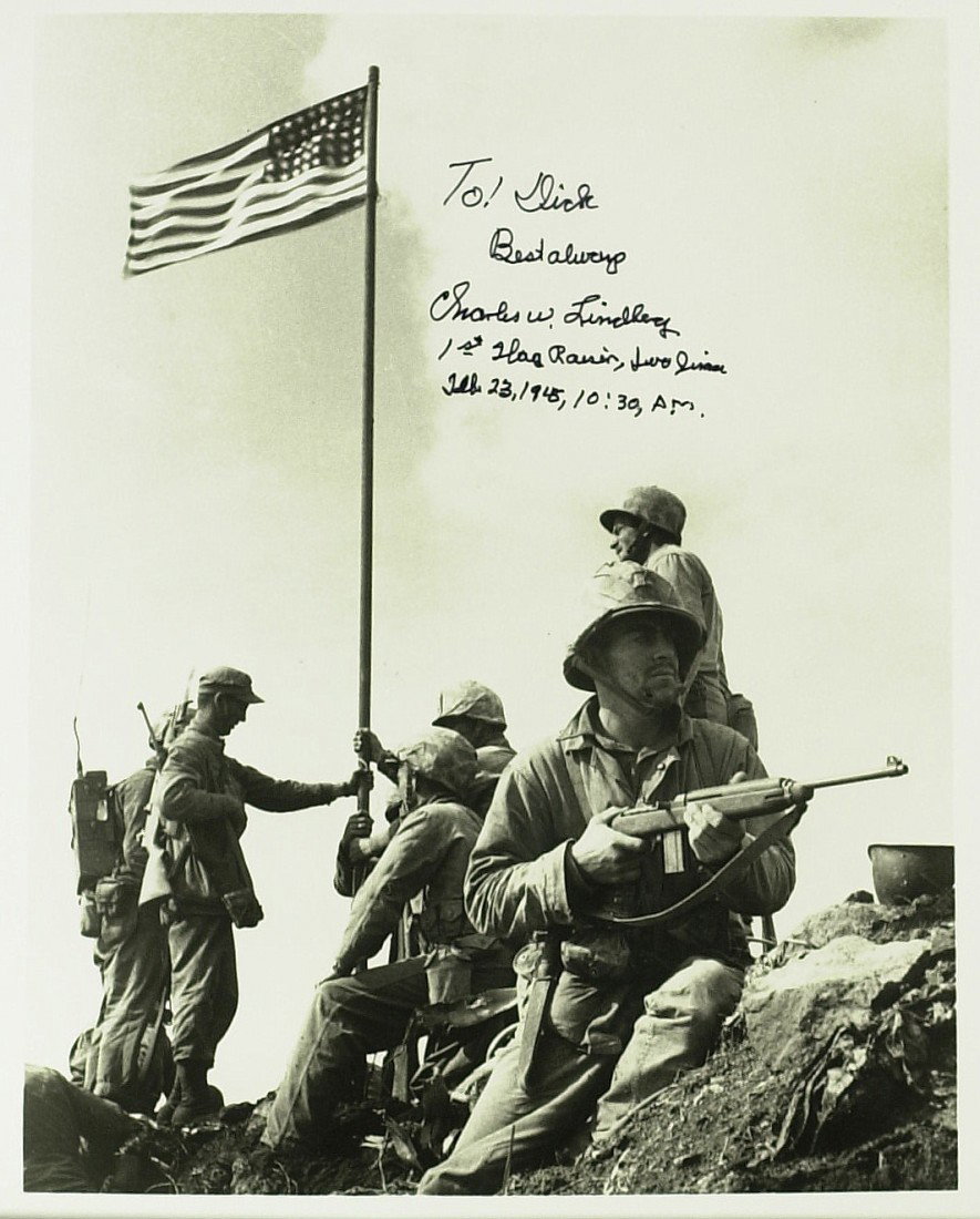 Iwo Jima Flag Raiser CHAS LINDBERG - Photograph: Charles W. Lindberg. 8" x 10" black and white photograph of the flag raising signed, "To Dick Best always Charles W. Lindberg 1st Flag Raising, Iwo Jima Feb. 23, 1945, 10:30, A. M..