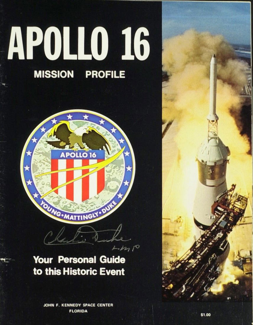 CHARLIE DUKE - Apollo 16 Booklet Signed: Charlie Duke. 8 ½" x 11", thirty-two page, souvenir booklet, Apollo 16 Mission Profile, signed on the cover in silver ink "Charlie Duke L M P." Minor rubbing.