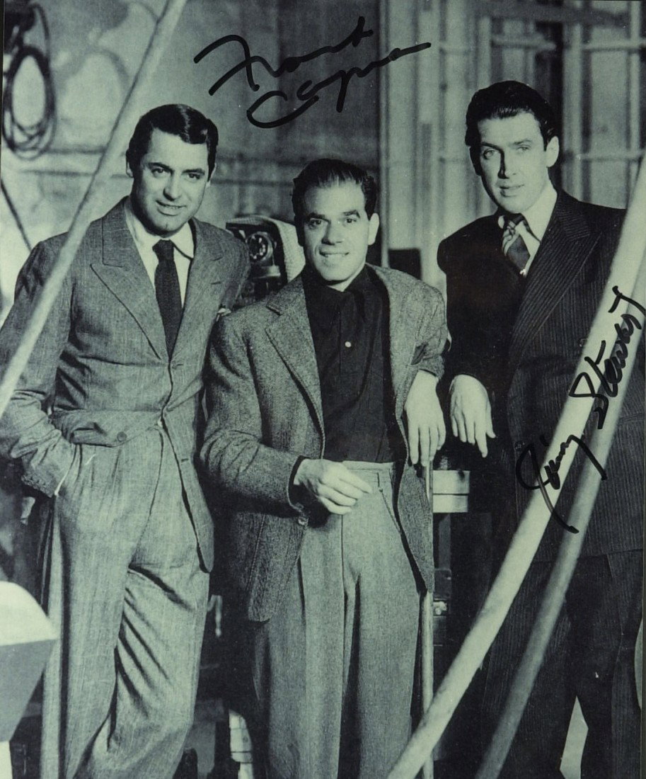 FRANK CAPRA and JIMMY STEWART - Photo Signed: Frank Capra (1897-1991) and James Stewart (1908-1997). Capra was Hollywood's leading director in the mid-1930s and 1940s, when he won three best director Oscars in just five years for his films It Hap